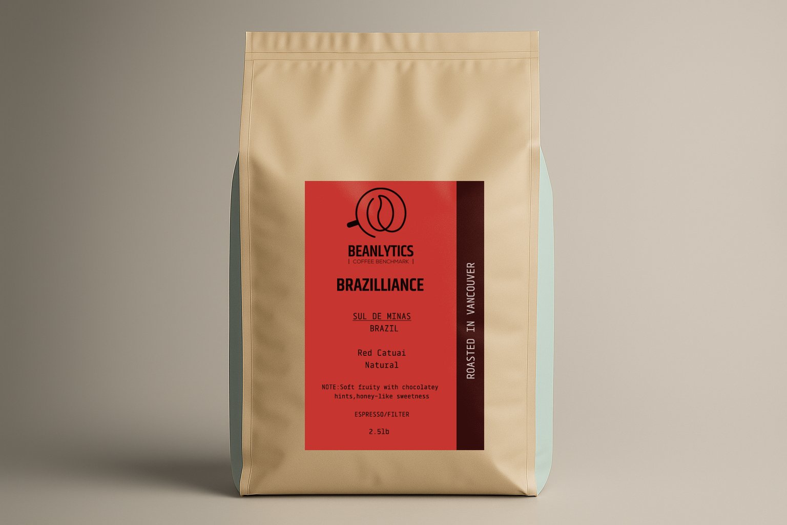 Front of the Beanlytics 'Braziliance' coffee bag, featuring Red Catuai natural process beans from Sul de Minas, Brazil. The packaging describes the flavor as safe and nutty with chocolatey notes and honey-like sweetness, suitable for espresso or filter brewing. This is a 2.5 lb bag roasted in Vancouver.