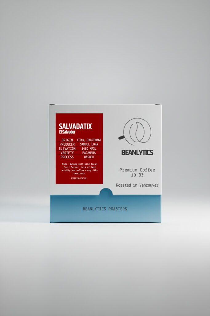 Front view of Beanlytics Coffee Roasters' SALVADATIX Pacamara 250g coffee bag on white background. Red label details "SALVADATIX Pacamara 1450 MASL" specs, premium branding, Vancouver roasted, with blue base.